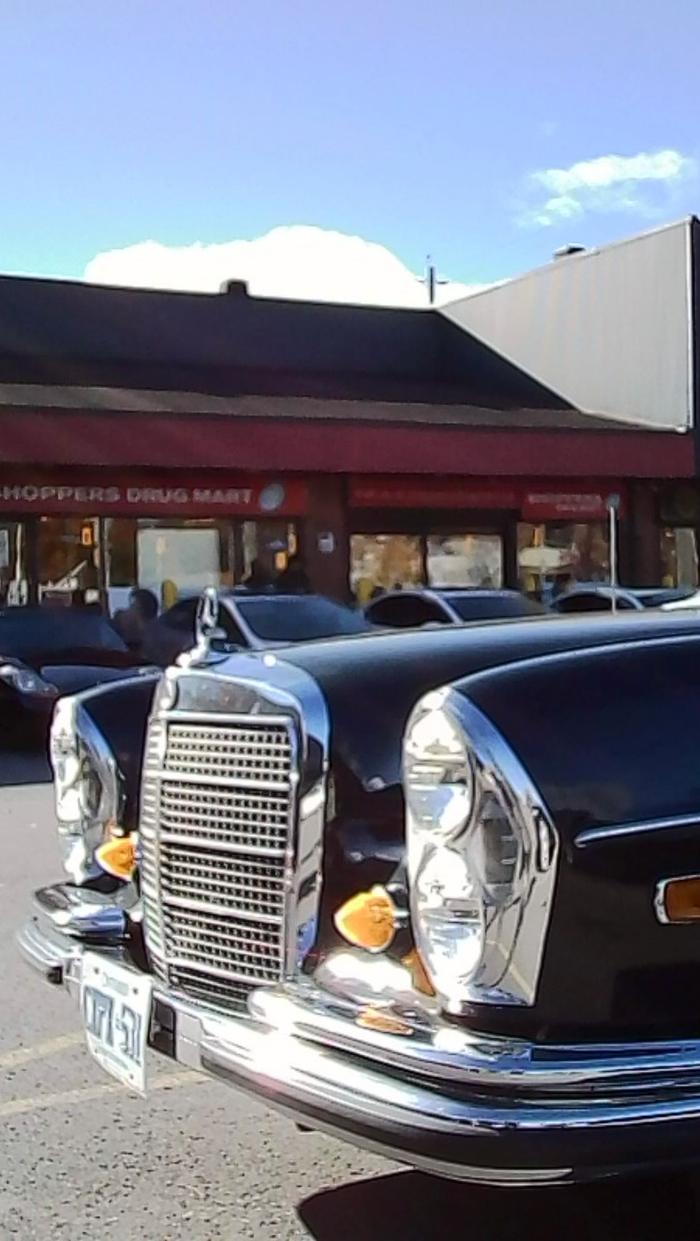Classic black Mercedes-Benz in the plaza lot